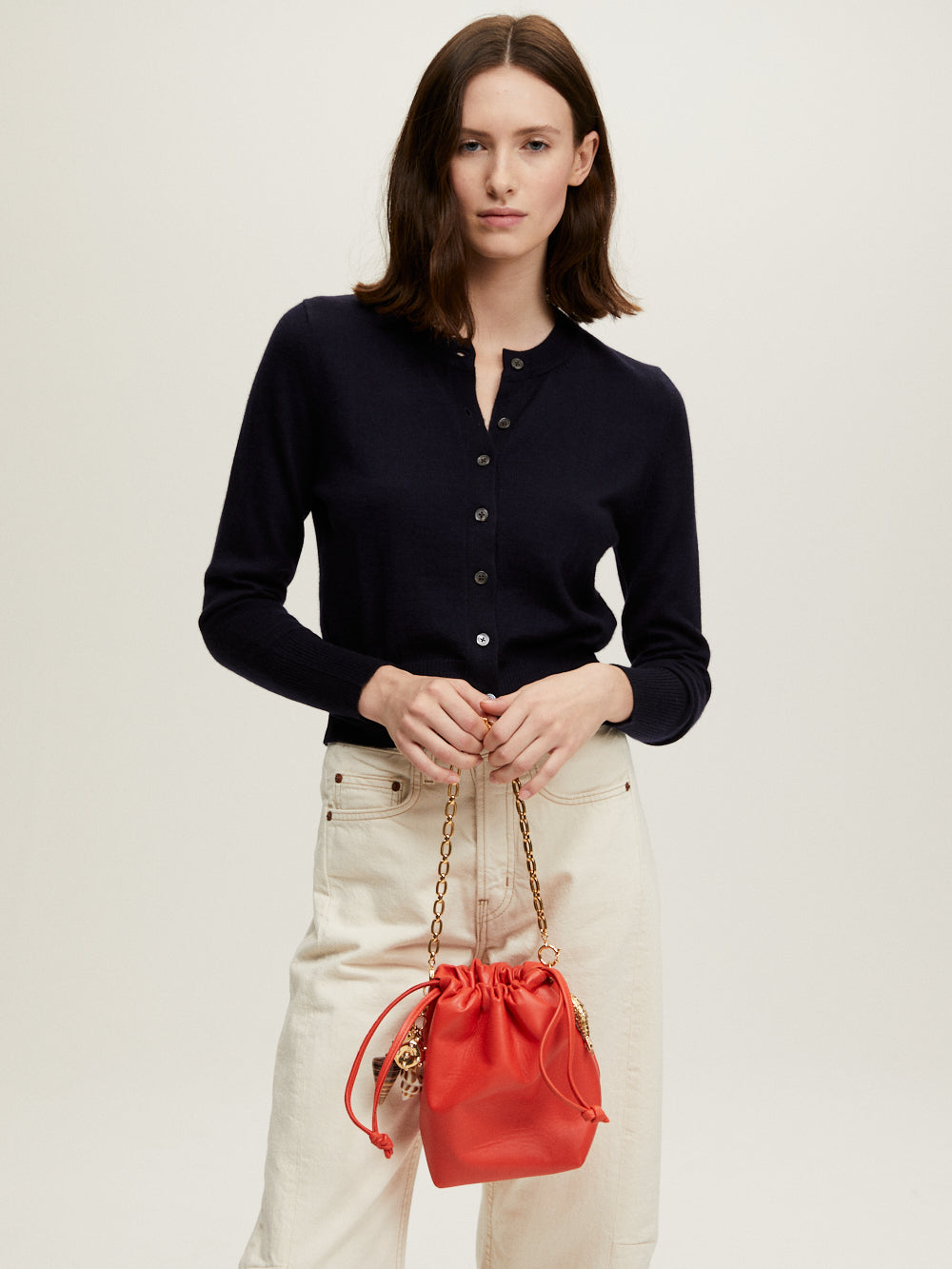 INAYA CORAL LEATHER BAG