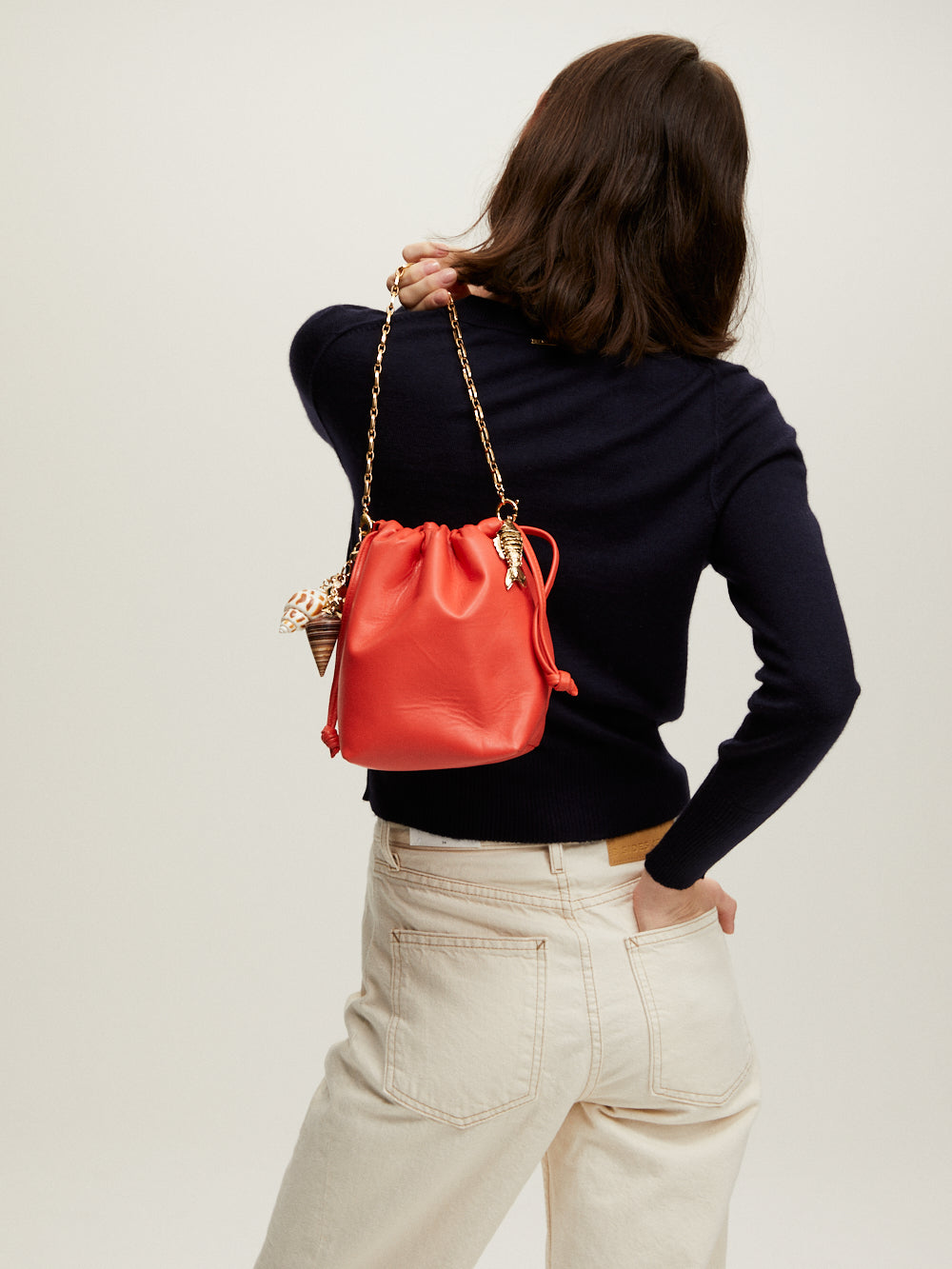 INAYA CORAL LEATHER BAG