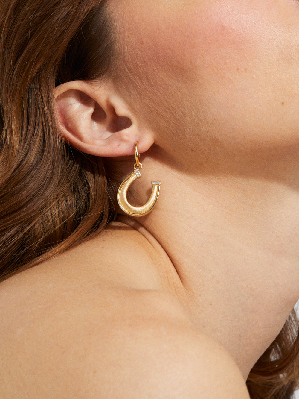 HORSESHOE GOLD AND DIAMOND PENDANT