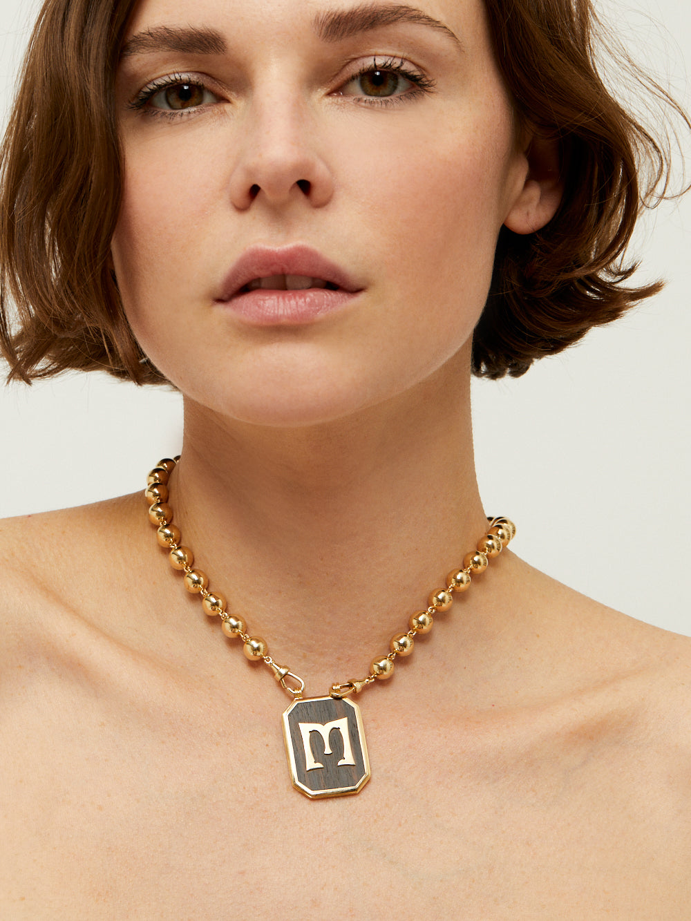 SCAPULAIRE EBONY LETTRE M OR, DIAMANT ET EBENE