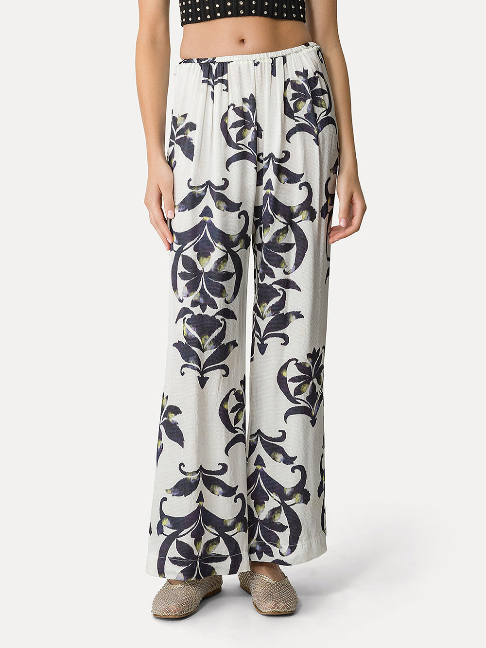 THE SECRET LILY PRINT TROUSERS