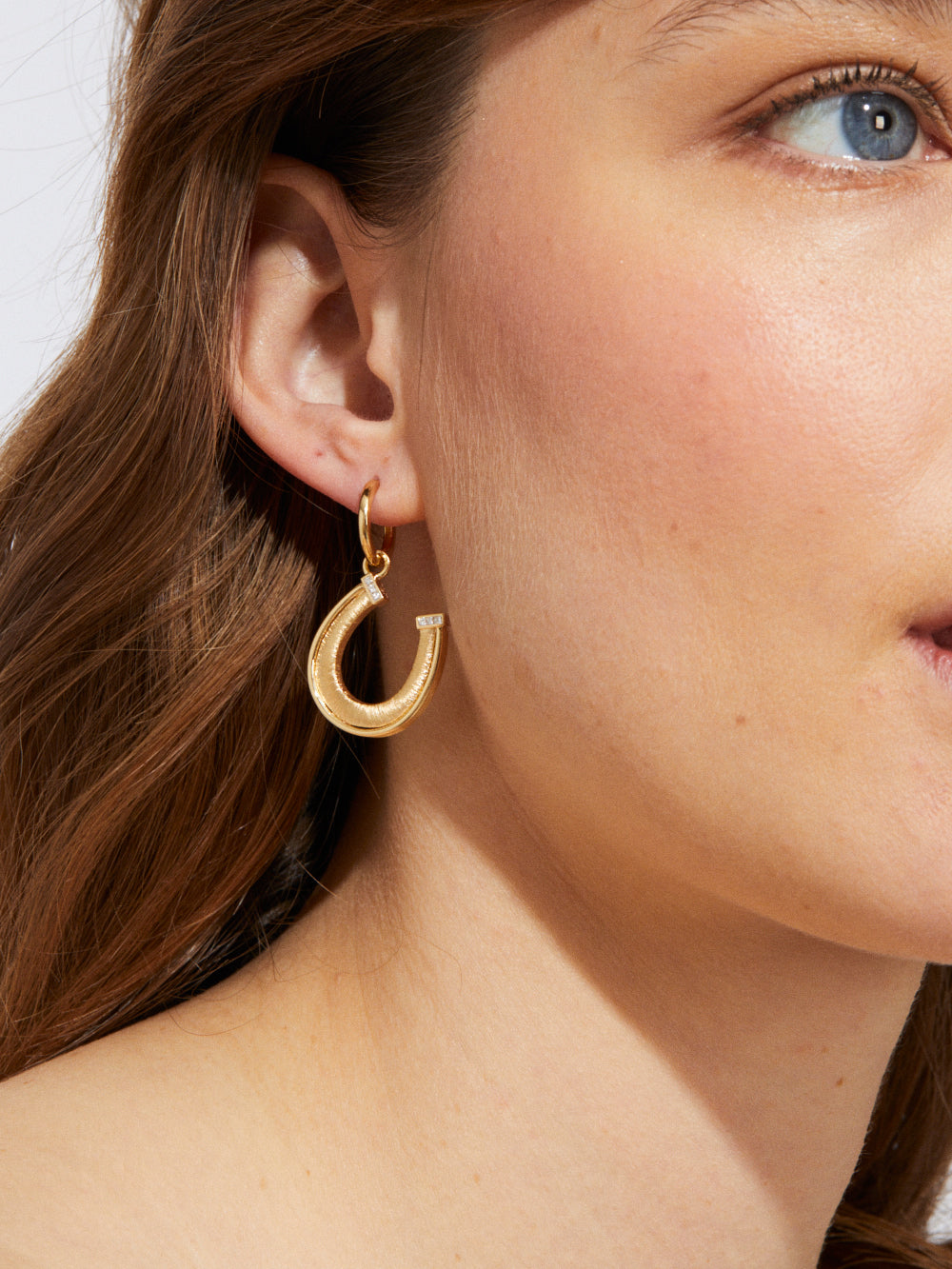 HORSESHOE GOLD AND DIAMOND PENDANT