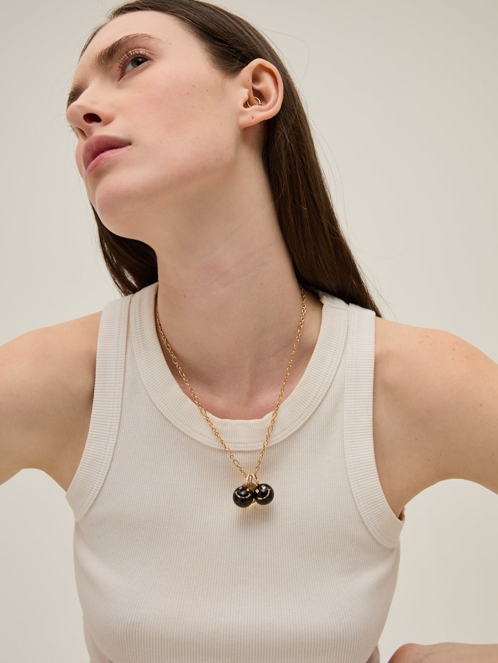 HAPPY FACE ONYX PENDANT