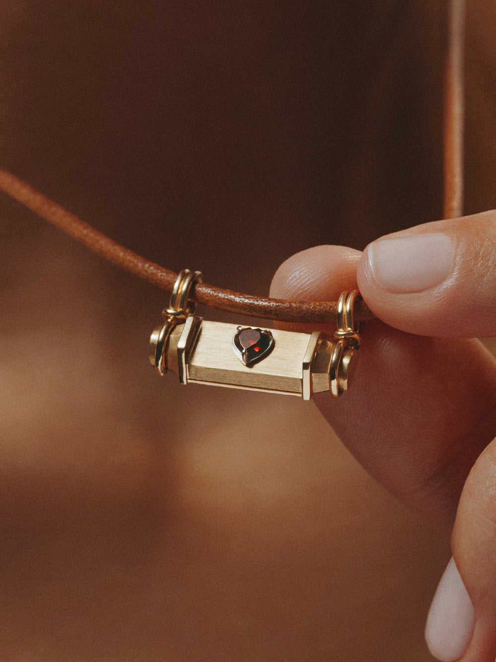 SMASH HEART LEATHER LOCKET OJ18K